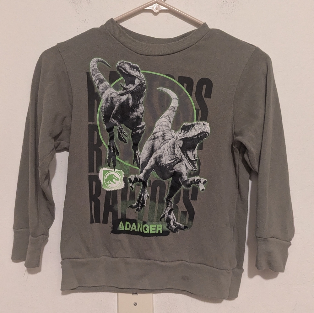 Universal city Studios Jurassic World green dinosaur sweater size small
